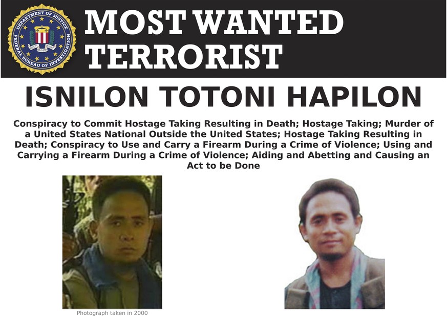 FILE - This undated file image provided by the Federal Bureau of Investigation (FBI) shows a wanted poster for Isnilon Hapilon, who was purportedly designated leader of the Islamic State group&#039;s  ...