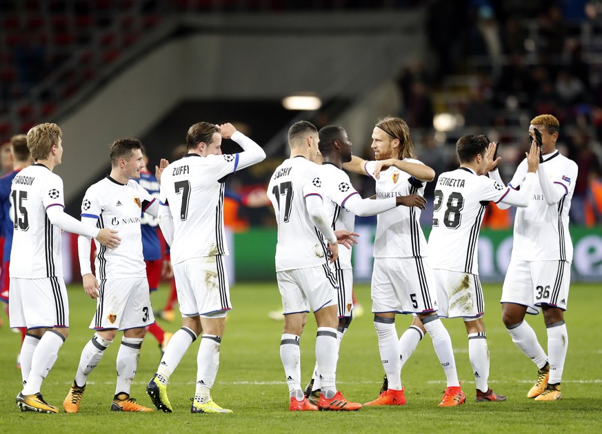 Basel players celebrate at the end of the Champions League Group A soccer match between CSKA Moscow and Basel in Moscow, Russia, Wednesday, Oct. 18, 2017. (AP Photo/Pavel Golovkin)