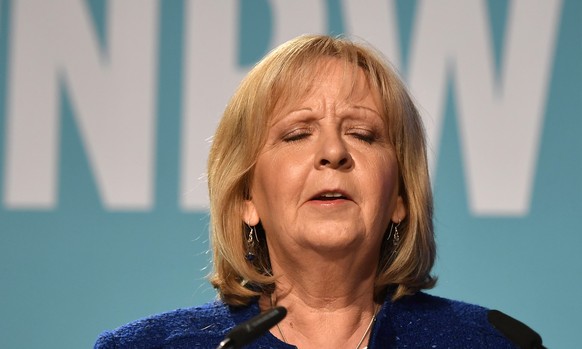 Governor Hannelore Kraft of the Social Democratic closes her eyes as she steps down after the state election in the western German state of Northrhine-Westphalia in Duesseldorf, Germany, Sunday, May 1 ...