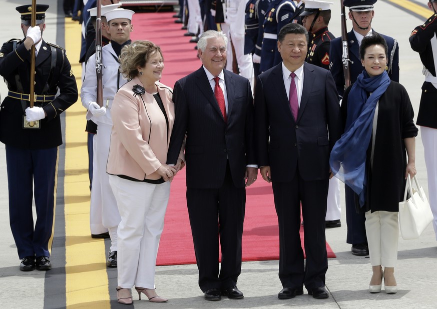 Secretary of State Rex Tillerson, second from left, with his wife Renda St. Clair, left, and Chinese president Xi Jinping and his wife Peng Liyuan, right, at the Palm Beach International Airport in We ...