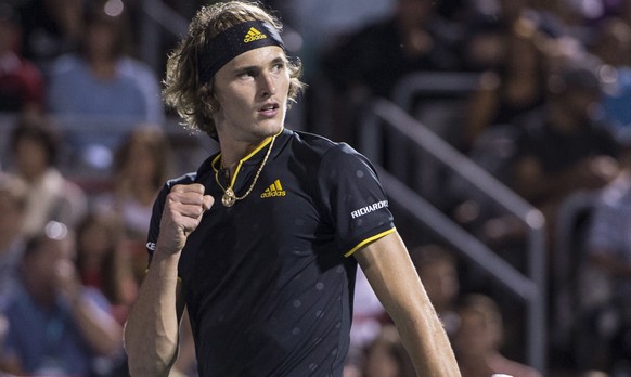 Alexander Zverev, of Germany, celebrates winning the first set over Denis Shapovalov, of Canada, during a semifinal of the Rogers Cup tennis tournament Saturday, Aug. 12, 2017, in Montreal. (Paul Chia ...