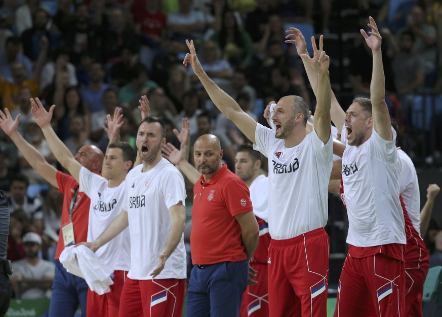 2016 Rio Olympics - Basketball - Semifinal - Men&#039;s Semifinal Australia v Serbia - Carioca Arena 1 - Rio de Janeiro, Brazil - 19/8/2016. Team Serbia cheers as head coach Sasha Djordjevic (SRB) of  ...