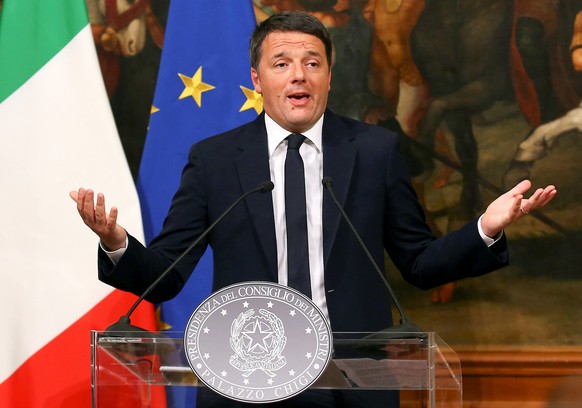 FILE PHOTO: Italian Prime Minister Matteo Renzi speaks during a media conference after a referendum on constitutional reform at Chigi palace in Rome, Italy, December 5, 2016. REUTERS/Alessandro Bianch ...