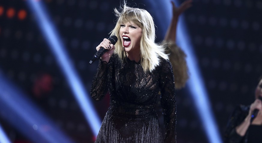 FILE - In this Feb. 4, 2017 file photo, Taylor Swift performs at the DIRECTV NOW Super Saturday Night Concert in Houston, Texas. A jury on Monday, Aug. 14, was expected to weigh Swift&#039;s allegatio ...