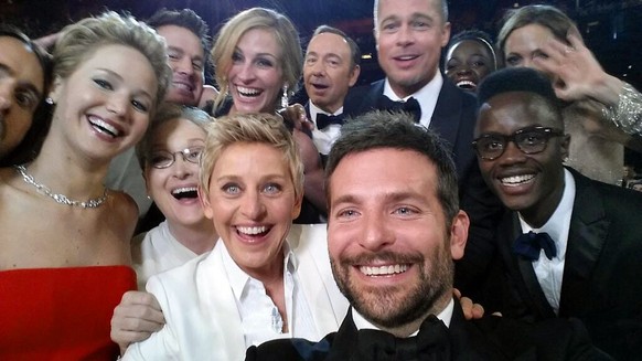 This image released by Ellen DeGeneres shows actors front row from left, Jared Leto, Jennifer Lawrence, Meryl Streep, Ellen DeGeneres, Bradley Cooper, Peter Nyong’o Jr., and, second row, from left, Ch ...