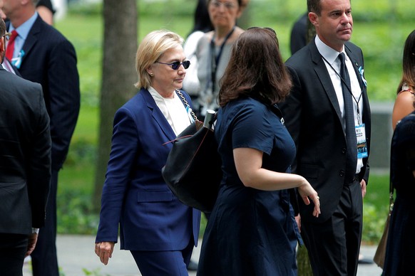 U.S. Democratic presidential candidate Hillary Clinton arrives for ceremonies to mark the 15th anniversary of the September 11 attacks at the National 9/11 Memorial in New York, New York, United State ...