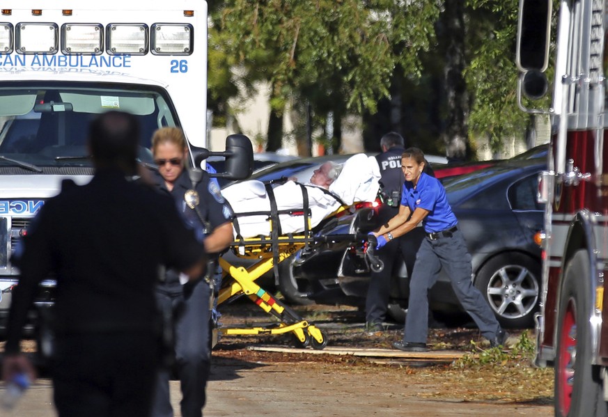 A woman is transported from The Rehabilitation Center at Hollywood Hills as patients are evacuated after a loss of air conditioning due to Hurricane Irma on Wednesday, Sept. 13, 2017 in Hollywood, Fla ...