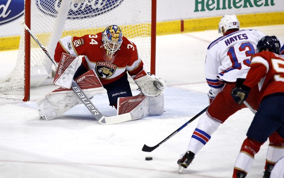 Mar 7, 2017; Sunrise, FL, USA; New York Rangers goalie Henrik Lundqvist (30) scores a goal past Florida Panthers goalie James Reimer (34) in the second period at BB&amp;T Center. Mandatory Credit: Rob ...