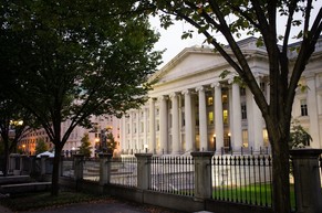 FILE - In this Wednesday, Oct. 16, 2013, file photo, the U.S. Treasury Building stands in Washington. The Treasury Department called for additional oversight and some increased regulations for the onl ...