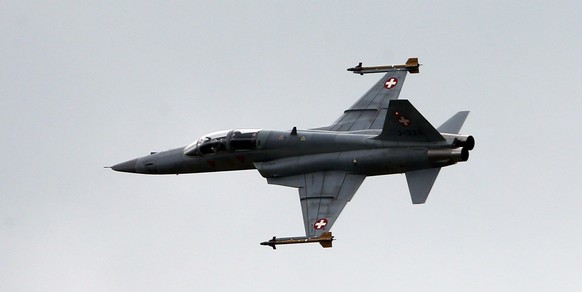 (L-R) Swiss Air Force historic aircrafts DH-115 Vampire, F-5 Tiger, Hunter and Mirage III perform during the Air14 airshow at the airport in Payerne August 31, 2014. The Swiss Air Force celebrates the ...