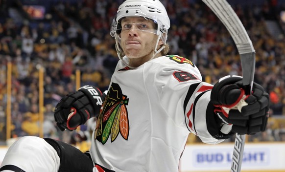 Chicago Blackhawks right wing Patrick Kane celebrates after scoring a goal against the Nashville Predators during the first period of an NHL hockey game Saturday, March 4, 2017, in Nashville, Tenn. (A ...