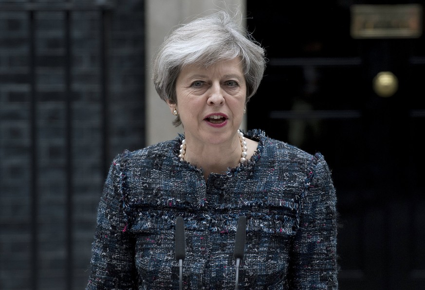 epa05982646 (FILE) - British Prime Minister Theresa May delivers a statement outside of No. 10 Downing Street in London, Britain, 03 May 2017 (23 May 2017). Prime Minister Theresa May is expected to c ...