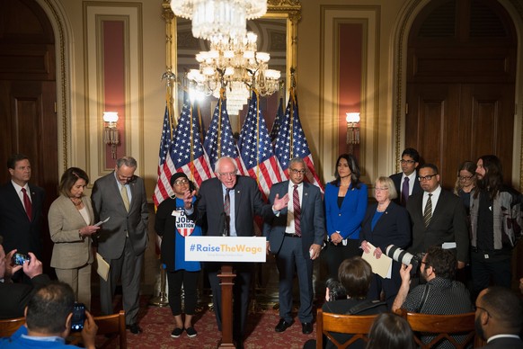 epa05990305 Independent US Senator from Vermont Bernie Sanders speaks at a press conference on Capitol Hill in Washington, DC, USA, 25 May 2017. Raise the Wage Act of 2017 would raise the minimum wa ...