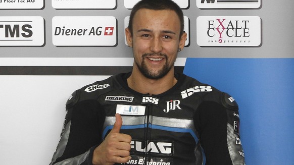 Moto2 rider Randy Krummenacher of Switzerland shows a thumbs up before the third free practice session ahead of Sunday&#039;s Malaysian Motorcycle Grand Prix in Sepang, Malaysia, Saturday, Oct. 24, 20 ...