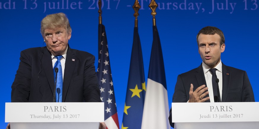 President Donald Trump and French President Emmanuel Macron participate in a joint news conference at the Elysee Palace in Paris, Thursday, July 13, 2017. (AP Photo/Carolyn Kaster)