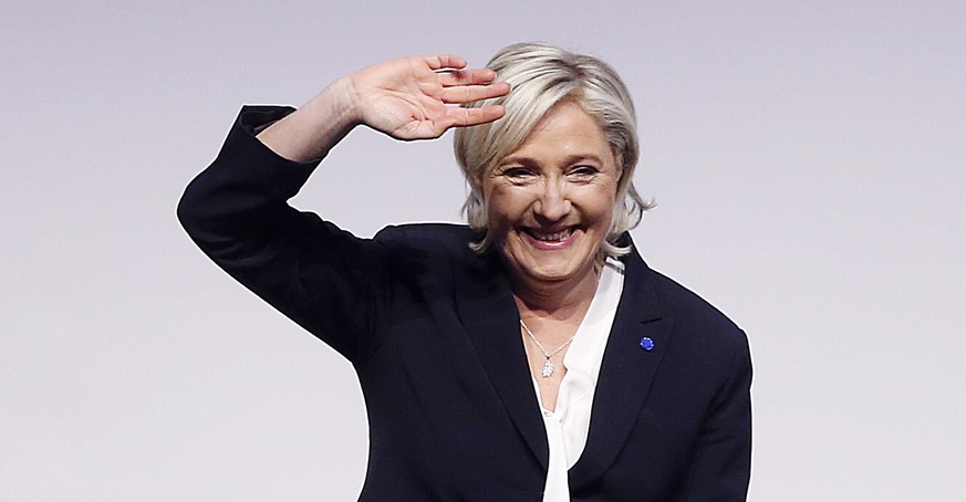 Far-right leader and candidate for next spring presidential elections Marine le Pen from France celebrates after her speech at a meeting of European Nationalists in Koblenz, Germany, Saturday, Jan. 21 ...