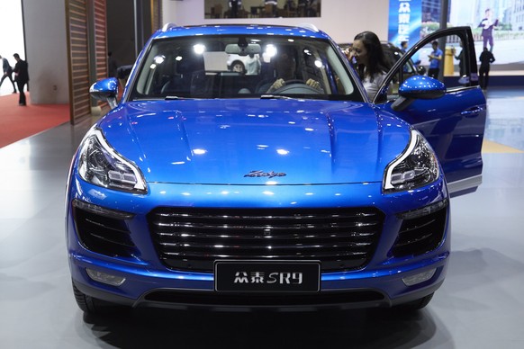 epa05917013 A visitor experiences the ZOTYE SR9 SUV 
at the Shanghai International Automobile Industry Exhibition 2017, in Shanghai, China, 20 April 2017. The Shanghai International Automobile Indust ...