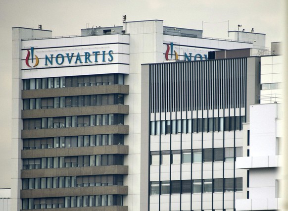 FILE - This Oct. 25, 2011 file photo shows the logo of Swiss pharmaceutical company Novartis AG on one of their buildings in Basel, Switzerland. Swiss pharmaceuticals company Novartis says Tuesday Jul ...