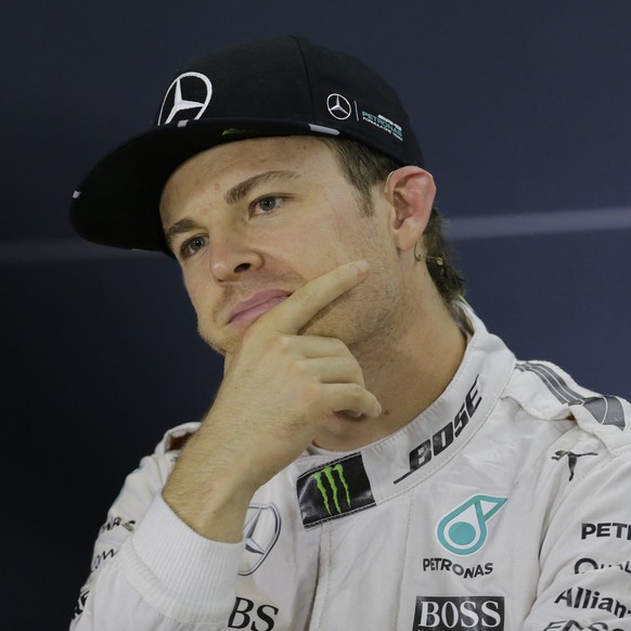 Mercedes driver Nico Rosberg of Germany attends a media conference after the qualifying session at the Yas Marina racetrack in Abu Dhabi, United Arab Emirates, Saturday, Nov. 26, 2016. The Emirates Fo ...