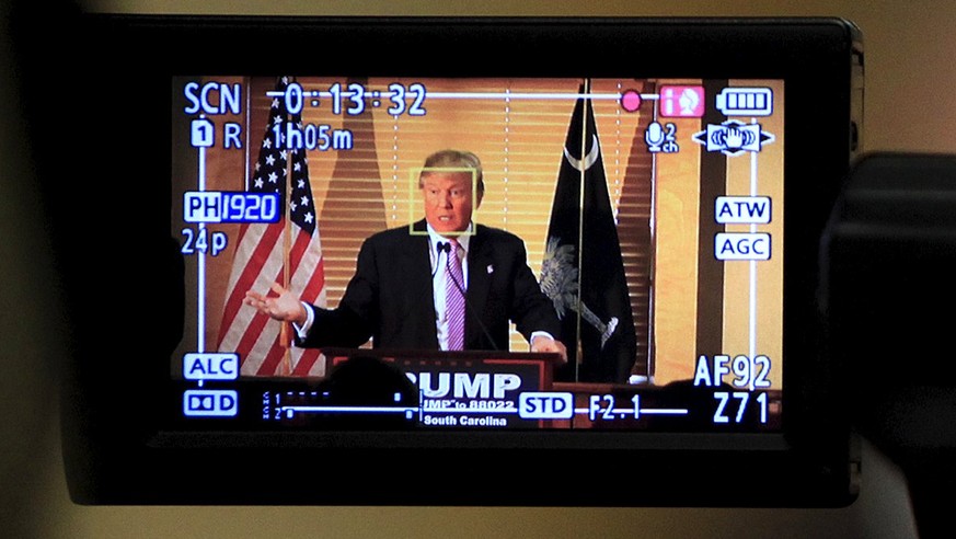 U.S. Republican presidential candidate Donald Trump speaks at a news conference, as seen through a video camera, at the Hanahan Town Hall in Hanahan, South Carolina February 15, 2016. REUTERS/Randall  ...