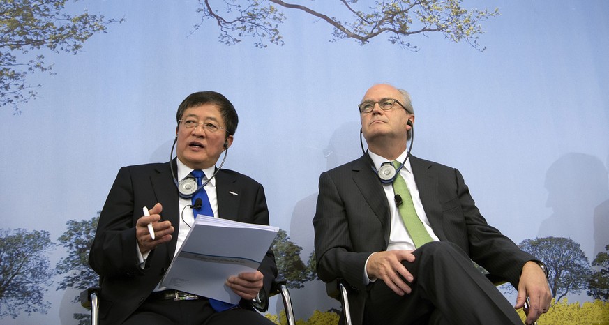 China meets Switzerland: Ren Jianxin von ChemChina und Syngenta-Präsident Michel Demare.