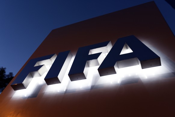 The FIFA Logo at the FIFA headquarters in Zurich, Switzerland, Friday, September 25, 2015. (KEYSTONE/Walter Bieri)