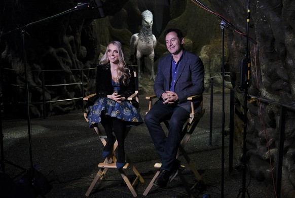 Actor Jason Isaacs, left, with Evanna Lynch, talk to the Associated Press during an interview at a new extension called the &#039;Forbidden Forest&#039; to the Warner Brothers studio tour &#039;The Ma ...