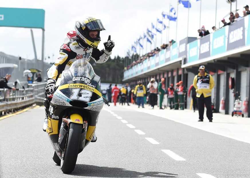 epa05598736 Thomas Luethi of Switzerland for Garage Plus Interwetten reacs as he wins the Moto2 class race during the 2016 Australian MotoGP at Phillip Island, Victoria, Australia, 23 October 2016. EP ...