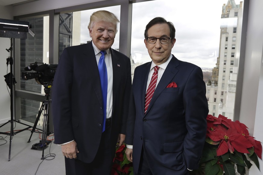 President-elect Donald Trump poses for a photo with Chris Wallace before his interview for &quot;Fox News Sunday&quot; at Trump Tower in New York, Saturday, Dec. 10, 2016. (AP Photo/Richard Drew)