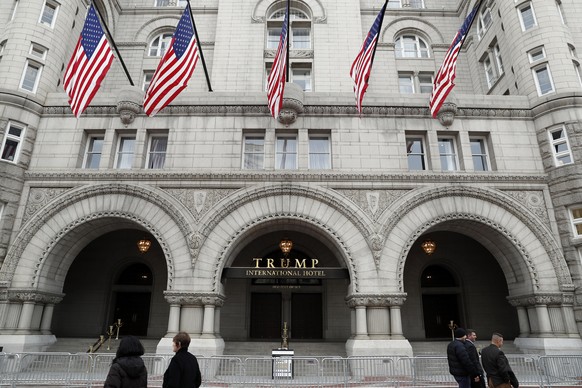 In this photo taken Dec. 21, 2016, the Trump International Hotel in Washington. A Pennsylvania man has been arrested at the Trump International Hotel in Washington after police say they found a rifle  ...