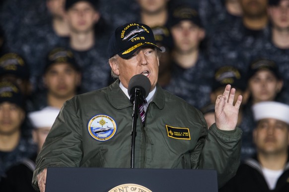 epa05825775 US President Donald J. Trump speaks to sailors aboard the Gerald R. Ford aircraft carrier in Newport News, Virginia, USA, 02 March 2017. Trump spoke about military readiness and his propos ...