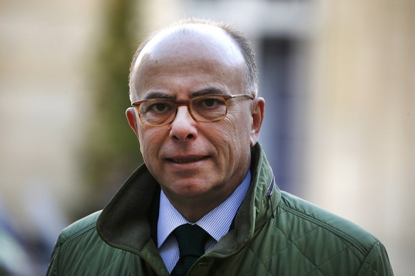 French Interior Minister Bernard Cazeneuve arrives to attend a news conference for the launching of the new campaign against radicalisation and jihadism at the Hotel Matignon in Paris, France, Novembe ...