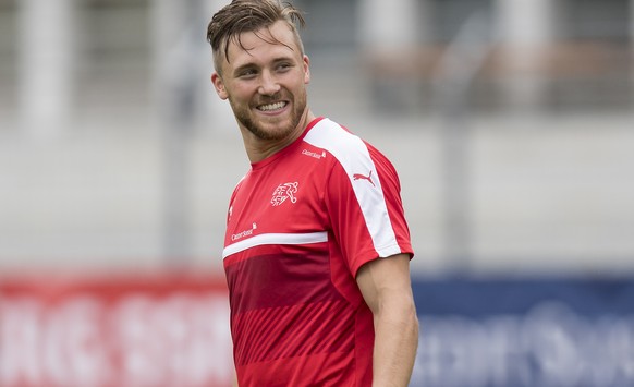 Swiss soccer player Silvan Widmer reacts during a training session of the national soccer team of Switzerland, in Lugano, Switzerland, Monday, 30 May 2016. The Swiss national soccer team prepares for  ...