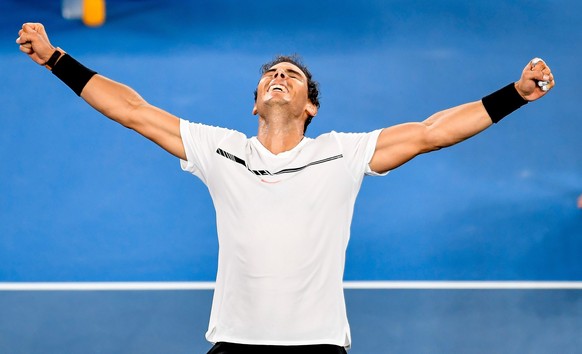 epa05754477 Rafael Nadal of Spain celebrates after winning his Men&#039;s Singles semifinal match against Grigor Dimitrov of Bulgaria at the Australian Open Grand Slam tennis tournament in Melbourne,  ...