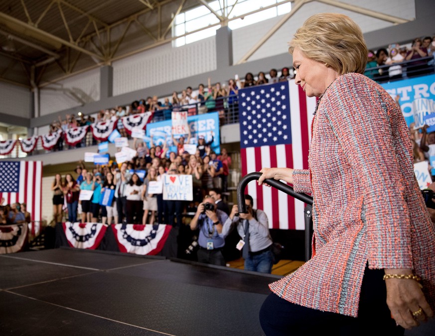 Democratic presidential candidate Hillary Clinton takes the stage to speak at a rally at University of North Carolina, in Greensboro, N.C., Thursday, Sept. 15, 2016. Clinton returned to the campaign t ...