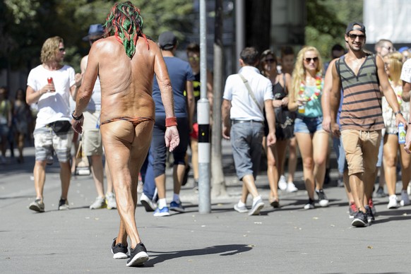 A participant is seen during the 24nd Street Parade, an annual dance music parade, in the city center of Zurich, Switzerland, Saturday, August 29, 2015. Hundreds of thousands of ravers participate in ...