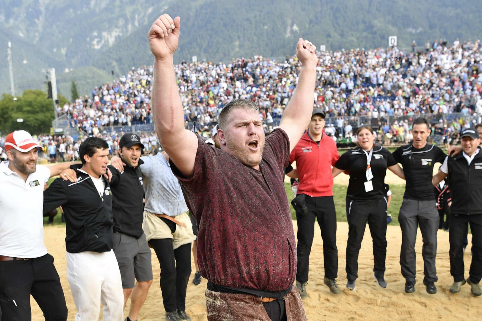 Christian Stucki celebrates with his teammates his victory in the final round at the Unspunnen Wrestling Event 2017 in Interlaken, Switzerland, Sunday, August 27, 2017. The Unspunnen Schwinget is one  ...