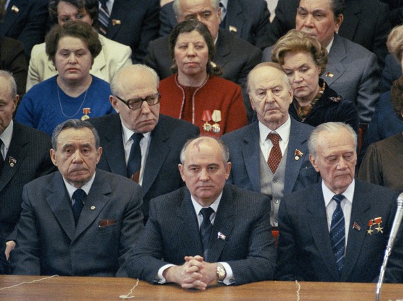 FILE - Mikhail Gorbachev, center, attends the International Women&#039; s Day Gala at the Bolshoi Theatre in Moscow on March 7, 1985. Left to right are: Politburo members Geidar Aliey, Mikhail Solomen ...