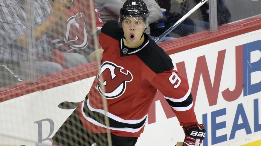 New Jersey Devils&#039; Taylor Hall celebrates his goal during the second period of an NHL hockey game against the Anaheim Ducks, Tuesday, Oct. 18, 2016, in Newark, N.J. (AP Photo/Bill Kostroun)