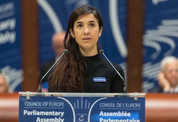 epa05579489 The former IS prisoner Nadia Murad delivers her speech after winning the Vaclav Havel Human Rights Prize in the Council of Europe in Strasbourg, France, 10 October 2016. The 23-year-old Je ...