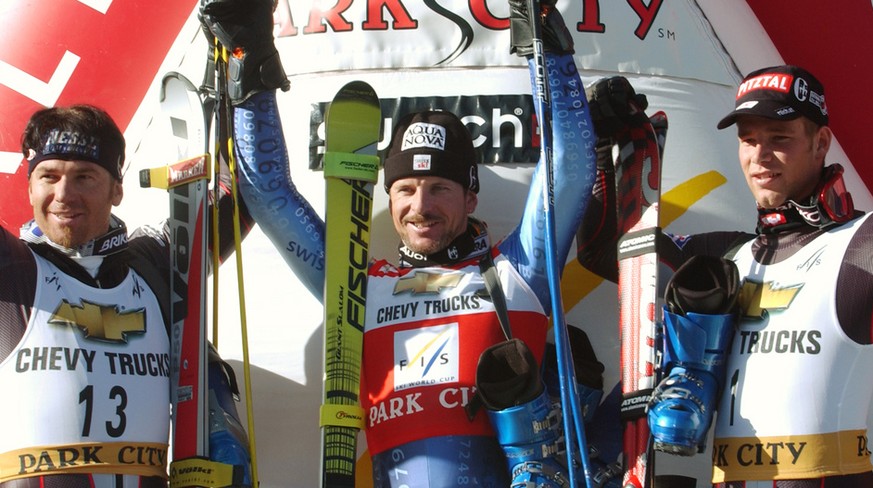 Austria&#039;s Christian Mayer, Switzerland&#039;s Michael Von Gruenigen and Austria&#039;s Benjamin Raich, left to right, stand on the podium after the America&#039;s Opening men&#039;s World Cup gia ...