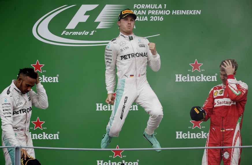 Formula One - F1 - Italian Grand Prix 2016 - Autodromo Nazionale Monza, Monza, Italy - 4/9/16
Mercedes&#039; Nico Rosberg celebrates his win on the podium after the race
Reuters / Max Rossi
Livepic ...