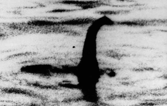 FILE -This is an undated file photo of a shadowy shape that some people say is a photo of the Loch Ness monster in Scotland. An underwater robot exploring Loch Ness has discovered a dark, monster-shap ...