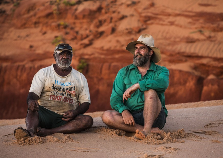 epa05874604 An undated handout photo made available by the University of Queensland on 28 March 2017, of local Goolarabooloo Law Boss Phillip Roe (L) and Dr Steve Salisbury (R), whose team discovered  ...