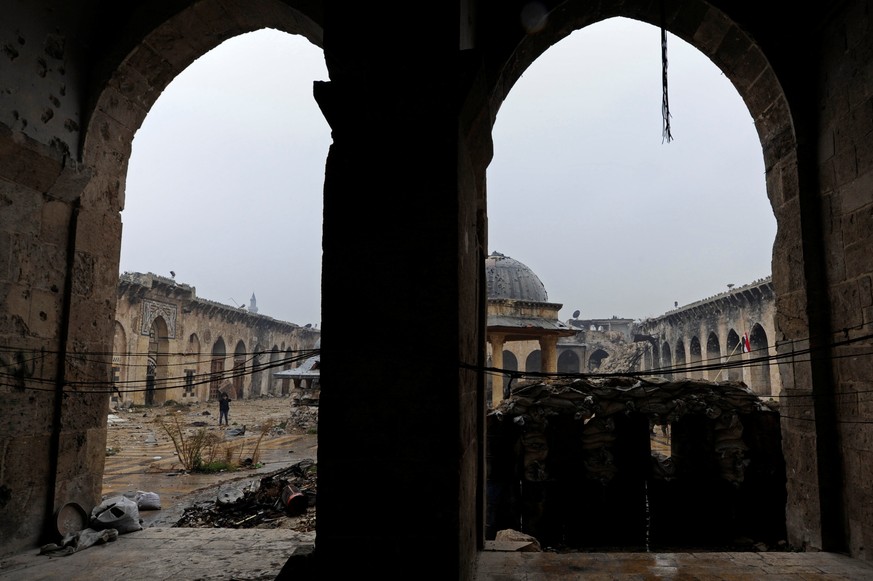 Damage is seen inside Aleppo&#039;s Umayyad mosque, Syria December 13, 2016. REUTERS/Omar Sanadiki SEARCH &quot;ALEPPO HERITAGE&quot; FOR THIS STORY. SEARCH &quot;WIDER IMAGE&quot; FOR ALL STORIES.