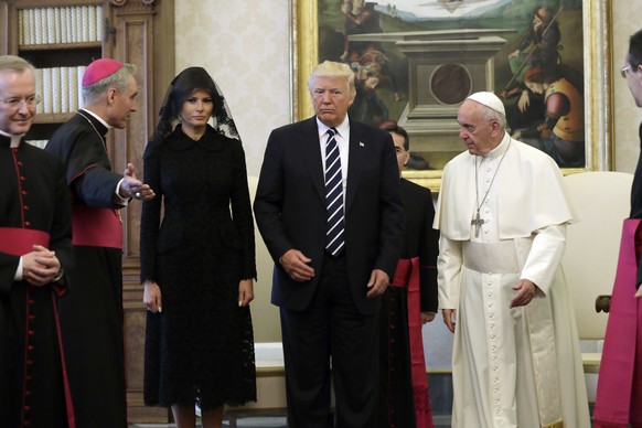 FILE - In this May 24, 2017 file-pool photo, President Donald Trump and first lady Melania Trump meet with Pope Francis at the Vatican. Sean Spicer finally got to meet the Pope. Vatican spokesman Greg ...