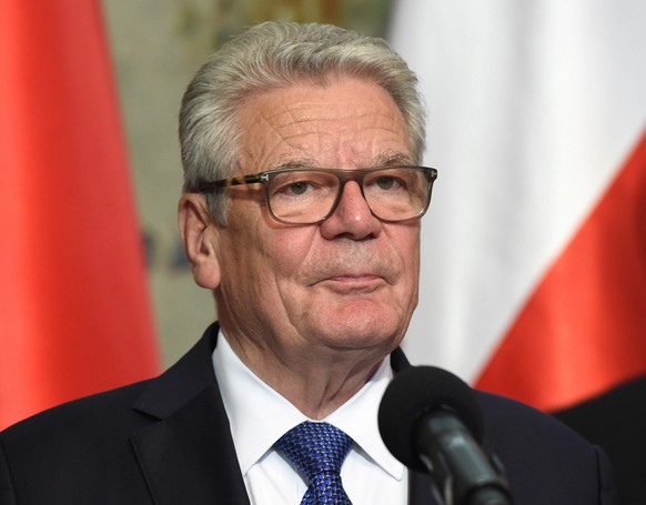 epa05372967 German President Joachim Gauck speaks during the inauguration of a Polish-German reflection group at the Belweder Palace in Warsaw, Poland, 17 June 2016. German President Joachim Gauck beg ...