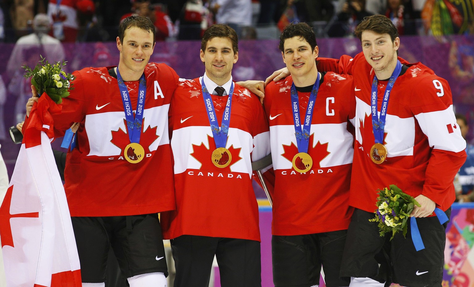 (L-R) Canada&#039;s Jonathan Toews, John Tavares, Sidney Crosby and Matt Duchene pose with their gold medals following their men&#039;s ice hockey gold medal victory over Sweden at the Sochi 2014 Wint ...