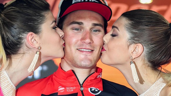 Switzerland&#039;s Silvan Dillier is kissed by race hostesses after winning the sixth stage of the Giro d&#039;Italia, Tour of Italy cycling race, from Reggio Calabria to Terme Luigiane, Italy, on Thu ...