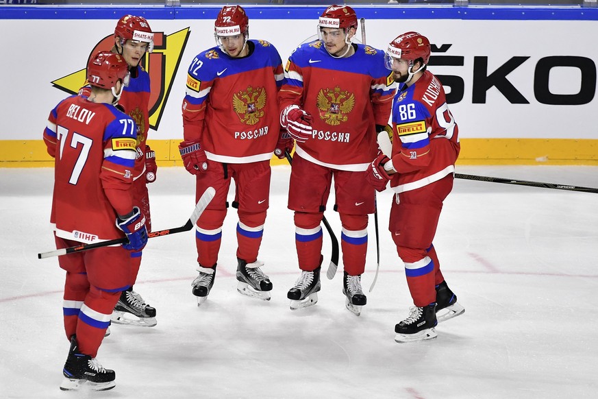 epa05957279 Russia&#039;s defender Bogdan Kiselevich (2-R) celebrates with his teammates after scoring the 1-0 lead during the 2017 IIHF Ice Hockey World Championship group A preliminary round match b ...